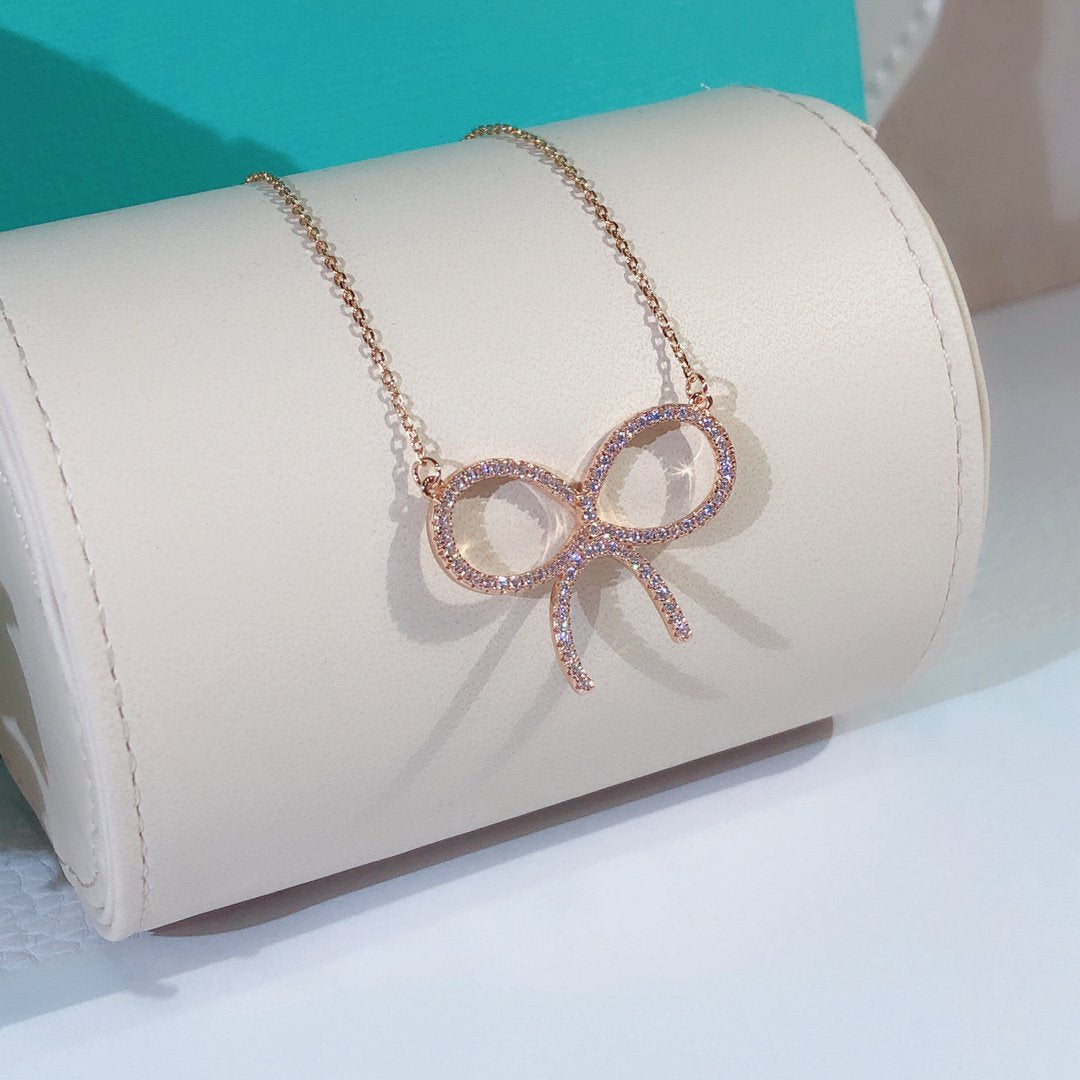 [Lume Jewelry]CLAW SET RHODIUM PLATED BOW NECKLACE