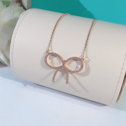 [Lume Jewelry]CLAW SET RHODIUM PLATED BOW NECKLACE