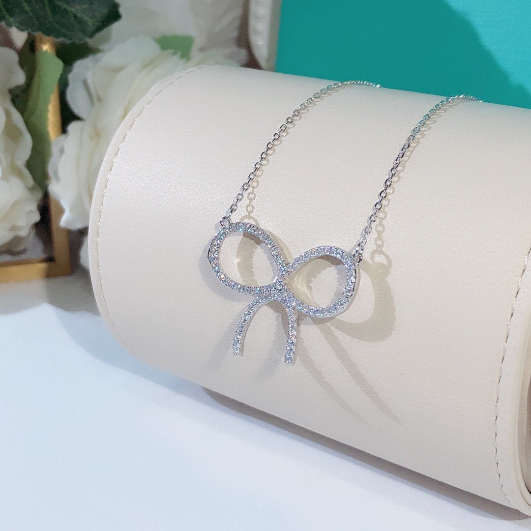 [Lume Jewelry]CLAW SET RHODIUM PLATED BOW NECKLACE